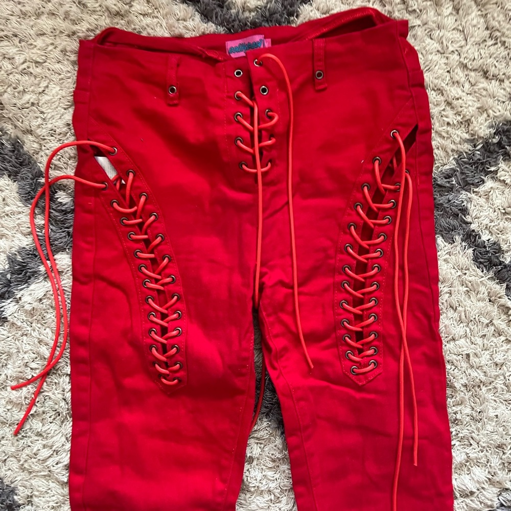 Red lace up stretchy pants. SIZE L. Ediked